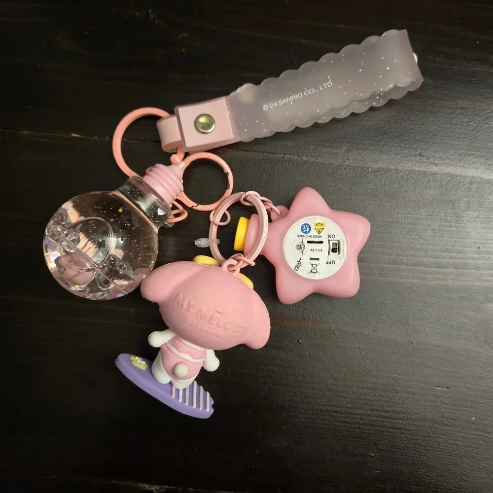 Sanrio My Melody Bundle Of 2 Pink Keychains Light Up And Globe